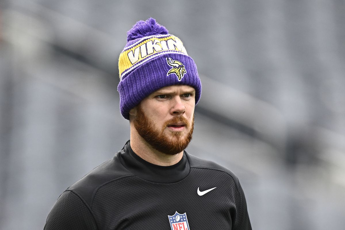 Sam Darnold #14 of the Minnesota Vikings warms up before playing the Chicago Bears at Soldier Field on November 24, 2024 in Chicago, Illinois.