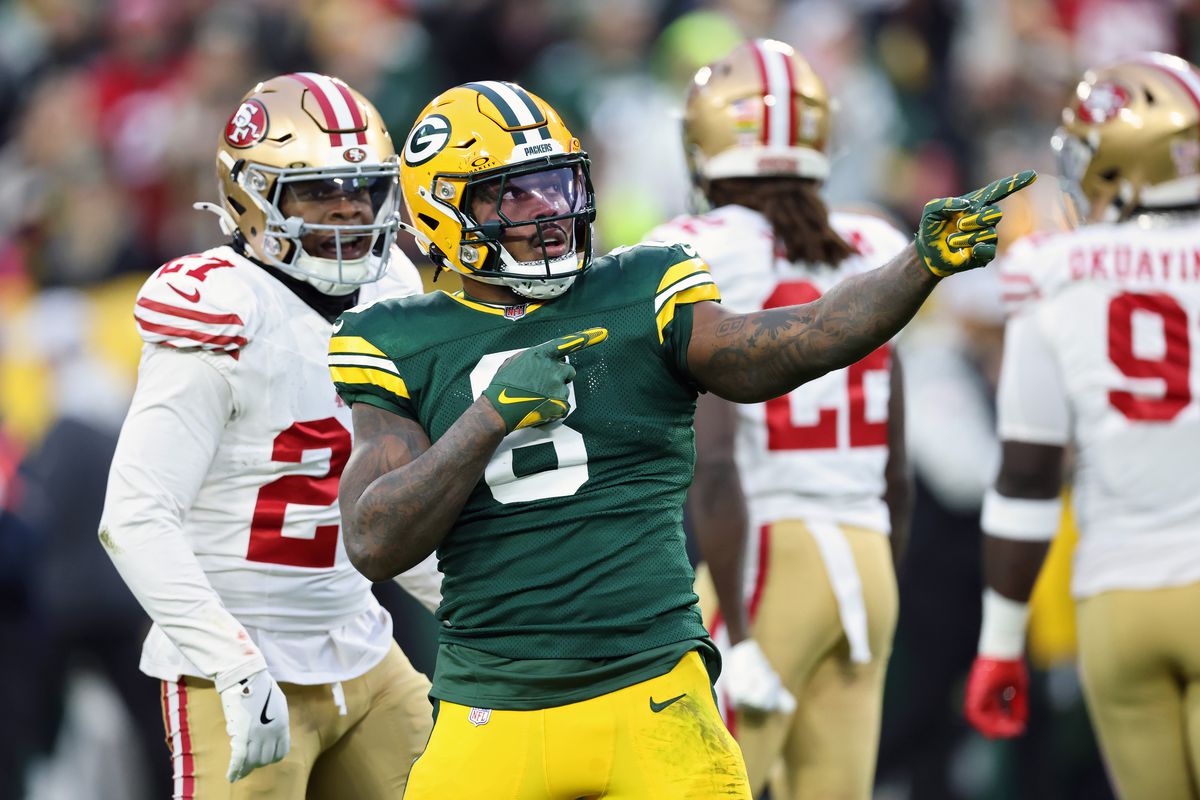 Josh Jacobs #8 of the Green Bay Packers celebrates in the first quarter against the San Francisco 49ers at Lambeau Field on November 24, 2024 in Green Bay, Wisconsin.
